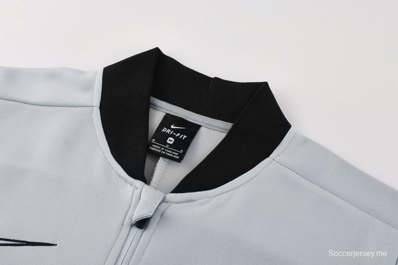 2025 سترة بسحاب كامل باللون الرمادي من نايك 2025 + بنطلون طويل