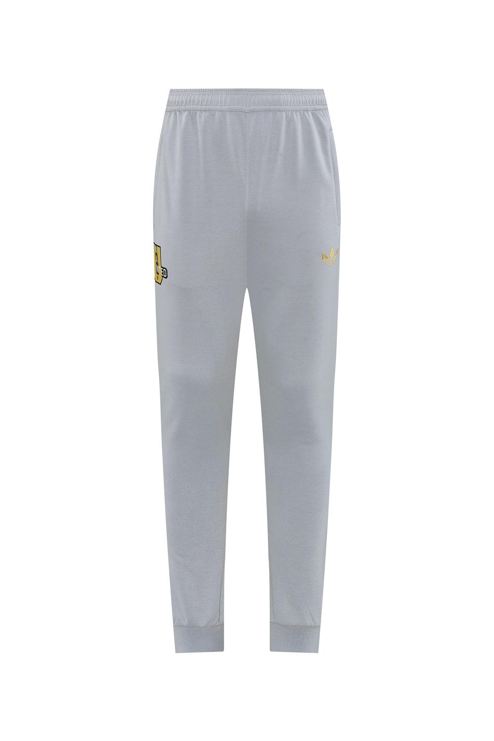 25/26 مانشستر يونايتد هويد جاكيت بسحاب كامل رمادي اللون هويد 25/26 مانشستر يونايتد + بنطلون طويل