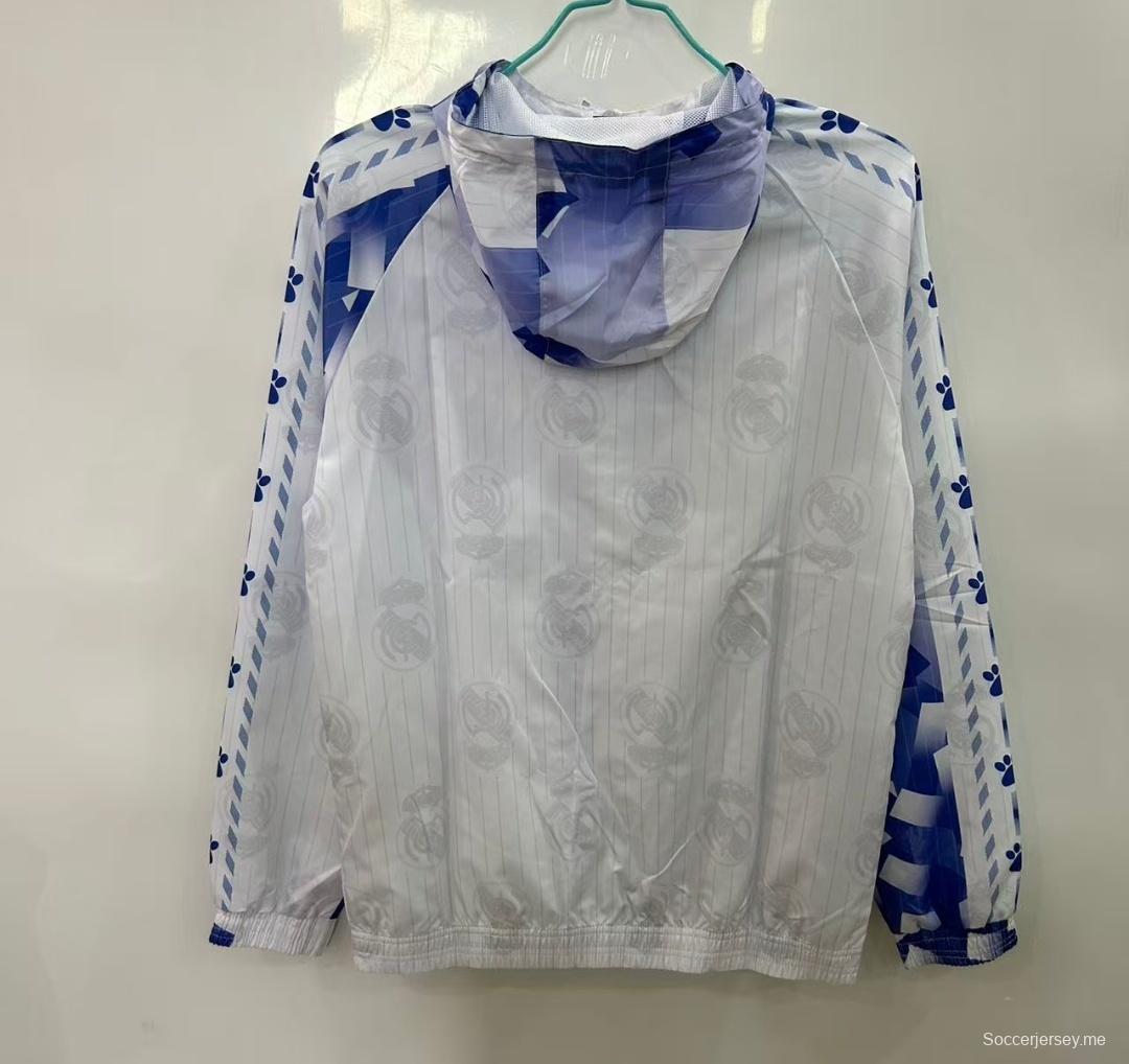 25/26 ريال مدريد سترة واقية من الريال أبيض بنقشة هندسية زرقاء