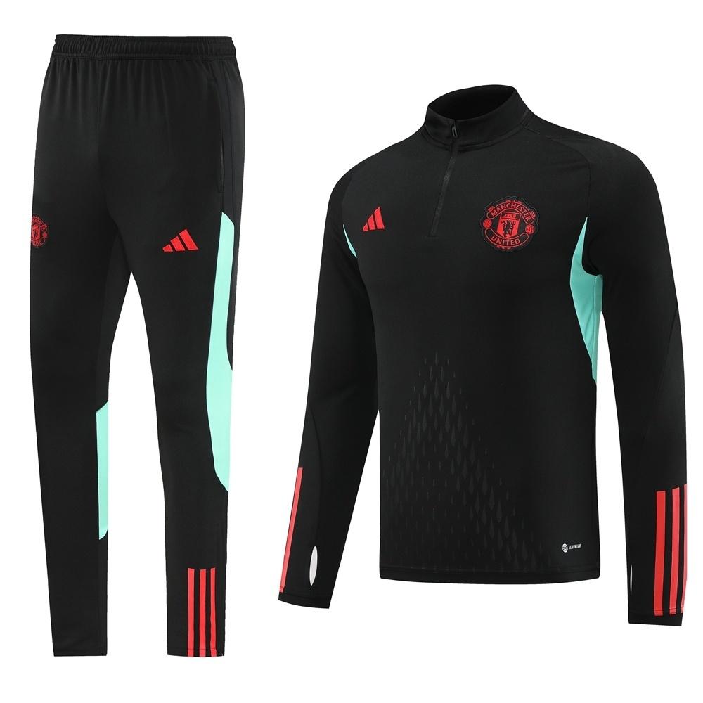 25/26 مانشستر يونايتد جاكيت أسود نصف سحاب + بنطلون طويل + بنطلون طويل