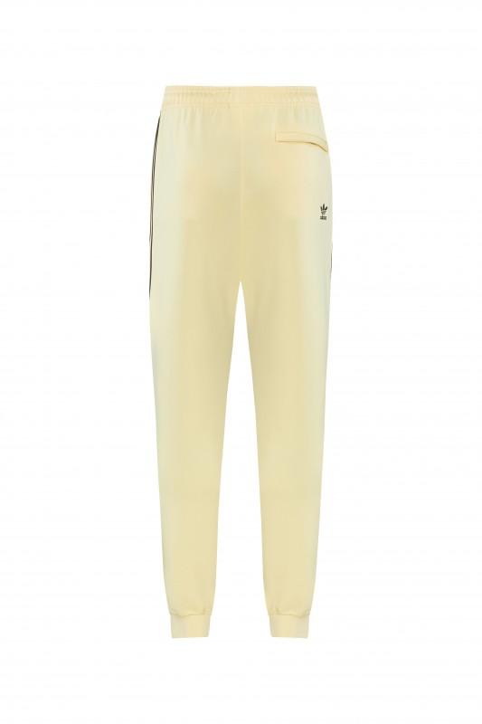 2026  سترة بأزرار كاملة + بنطال طويل من Adidas بلون المشمش