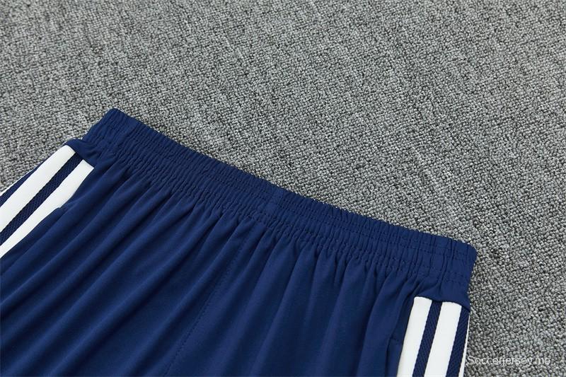 26/27 ريال مدريد - بدلة رياضية باللون الأزرق الداكن بسحاب نصف طول + بنطال طويل