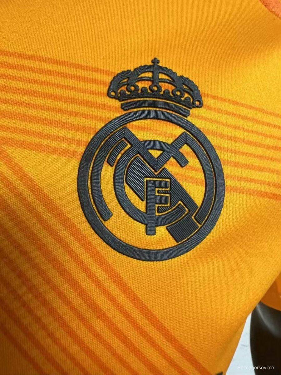 إصدار اللاعب 24/25 قميص ريال مدريد 24/25 ريال مدريد خارج أرضه برتقالي اللون
