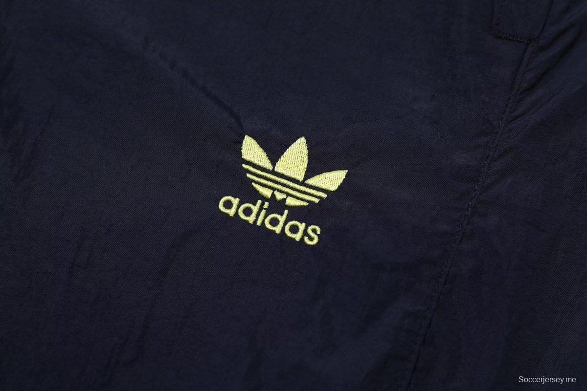 24/25 يوفنتوس سترة واقية من الريح باللون الكحلي + بنطال طويل + بنطلون طويل