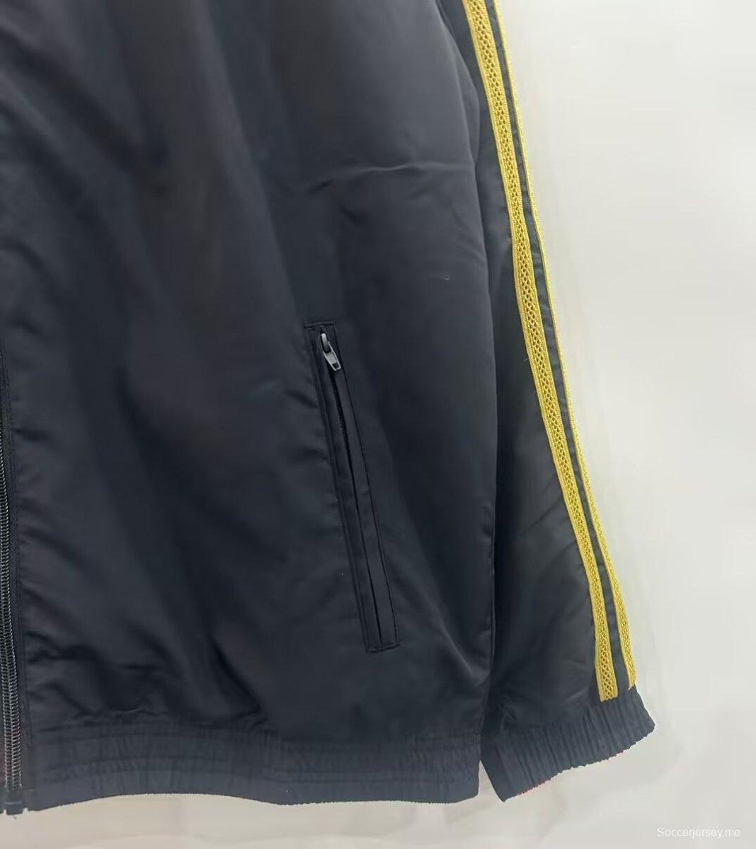 25/26 مانشستر يونايتد أحمر/أسود قابل للانعكاس بسحاب كامل واقي من الرياح